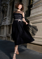 LUXE TULLE TEA LENGTH DRESS WITH CRYSTAL FLOWER AND WAIST TRIM
